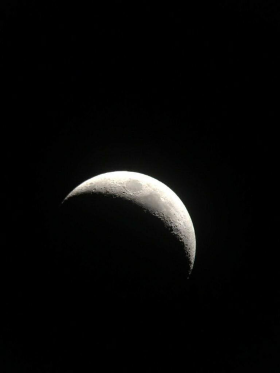 Lua minguante, tirada com telescópio